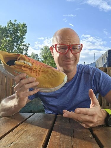 The author with one of his favorite shoes, the HOKA Carbon X, now replaced with models like the HOKA Cielo