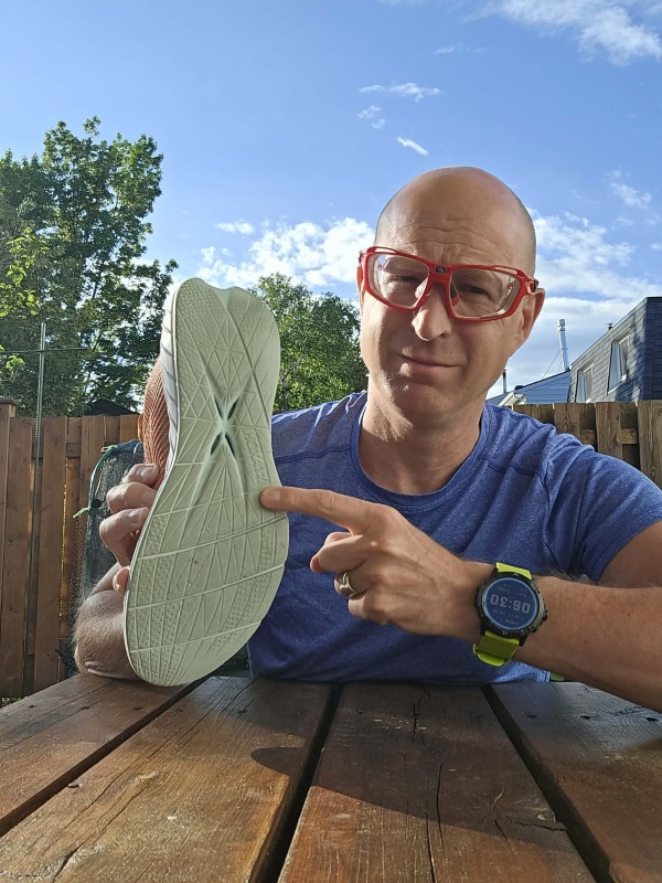 Noel Pointing at the shoe outsole Noel Pointing at the shoe outsole