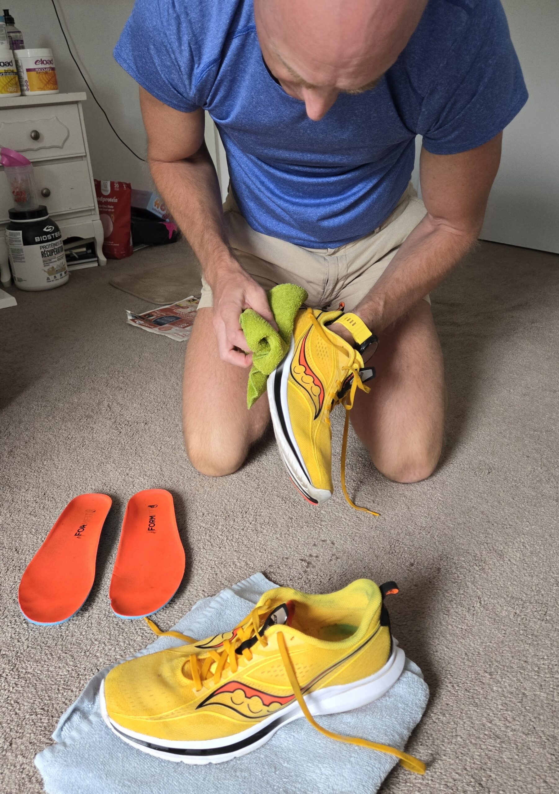 Wiping the shoes with a towel Wiping the Shoes With a Towel